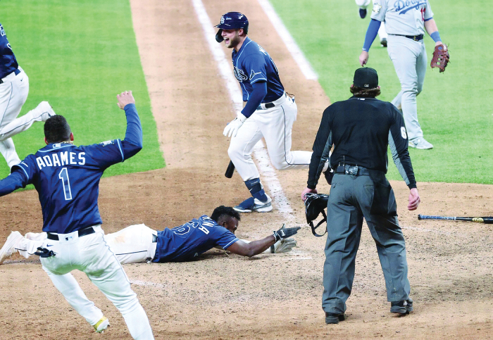 Rays walk off for 8-7 win over Dodgers to even World Series