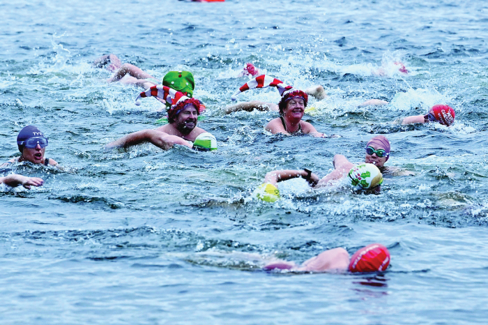 Swimmers brave the cold seas for Christmas day dip - Read Qatar Tribune ...