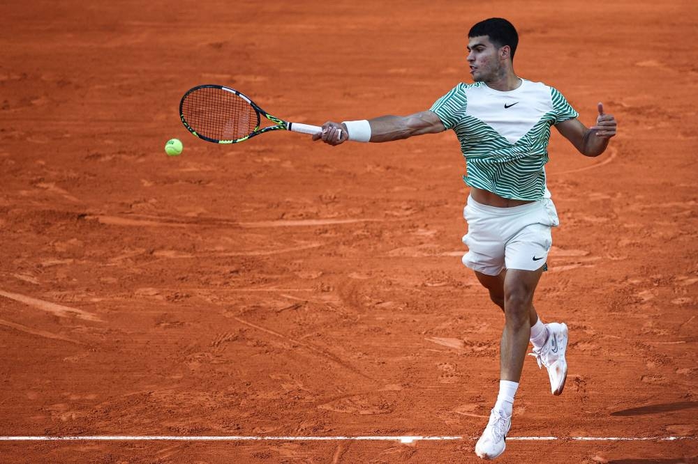 French Open: Djokovic, Alcaraz advance to third round in pursuit