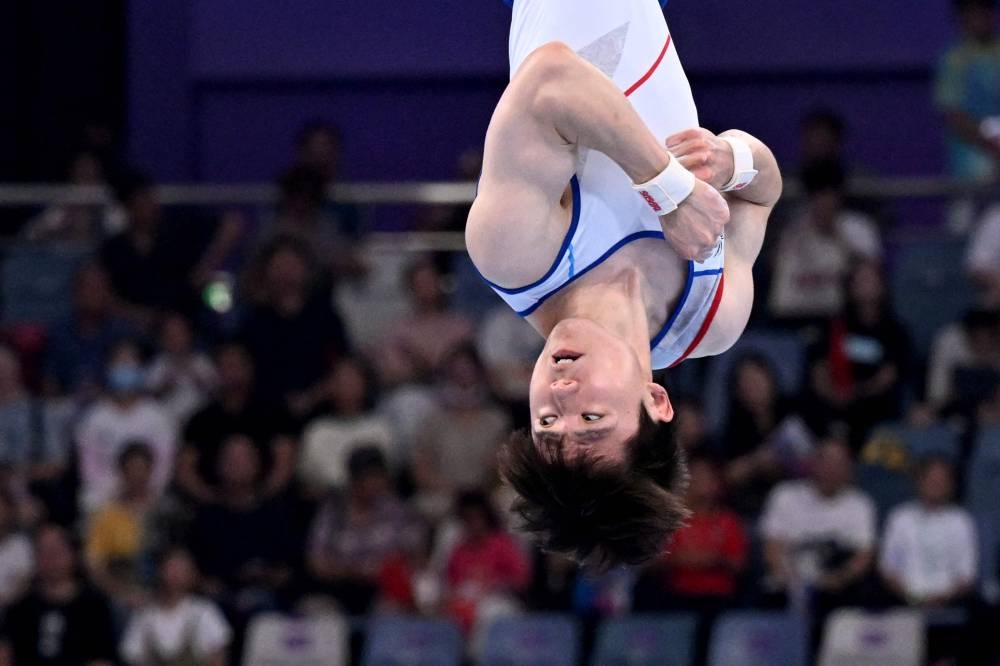 Gymnast Kim Han-sol wins gold in men's floor exercise