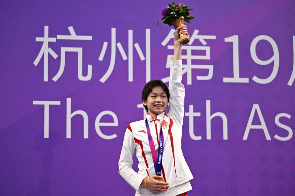 Olympic champion Quan leads Chinese 12 in women’s 10m platform diving