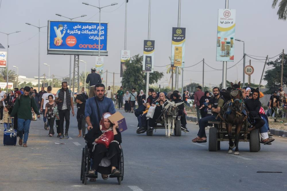 Thousands Of Palestinians Flee Northern Gaza In ‘desperate Journey ...