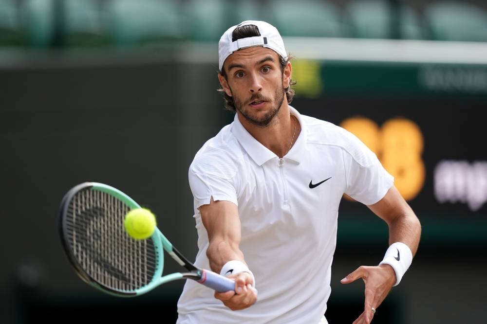 Musetti sets up Djokovic semi-final; Rybakina powers past Svitolina ...