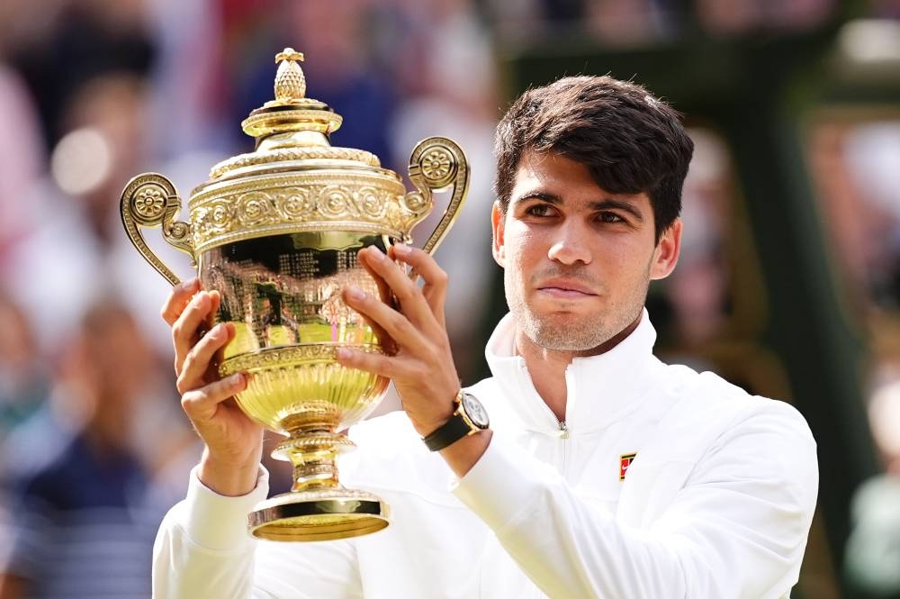 Alcaraz Dominates Djokovic to Secure Back-to-Back Wimbledon Titles.